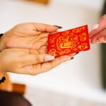 red envelope exchange for lunar new year celebration