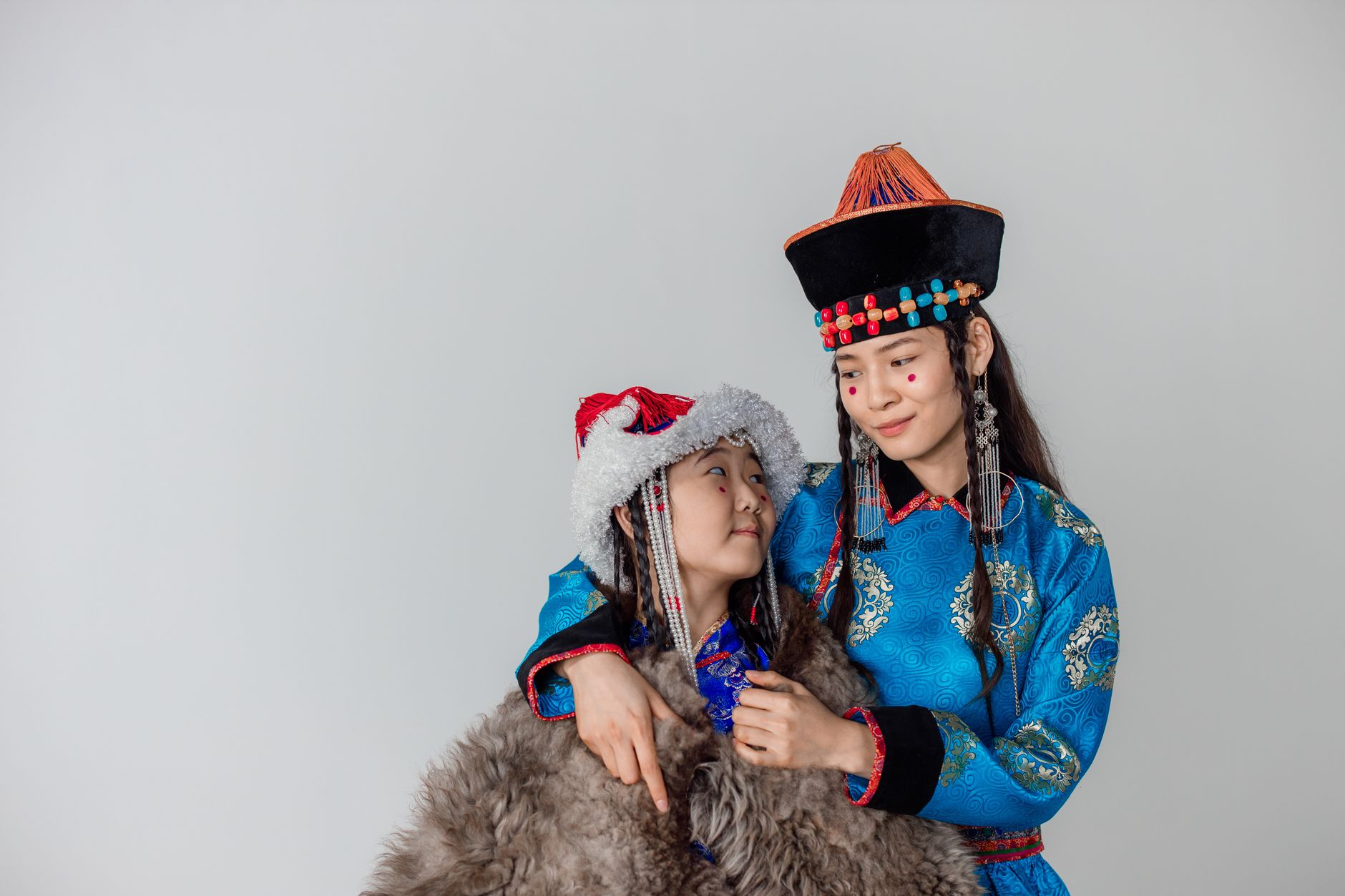 a girl wearing wearing a fur coat